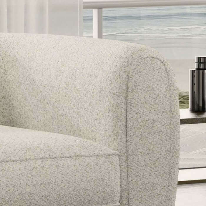 Close-up of Verdal Off White Sofa showcasing soft boucle fabric and modern bulbous shape. Ideal for contemporary living rooms.