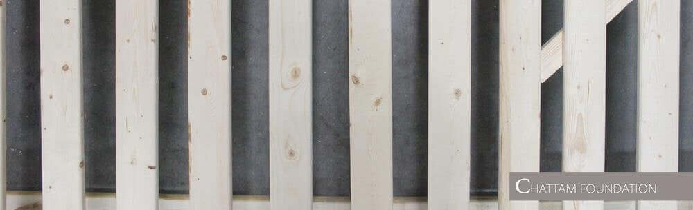 Chattam & Wells handcrafted 9" foundation showcasing sturdy wooden slats and sustainable materials for mattress support.