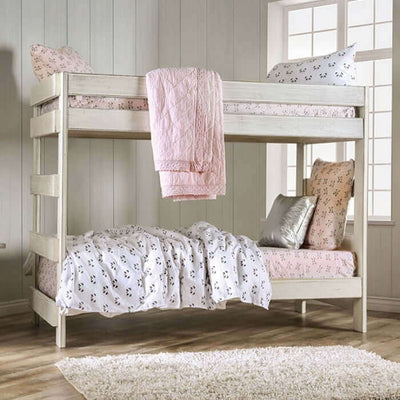 Arlette brushed white rustic pine wood bunk bed with soft bedding and pillows in a stylish bedroom setting.