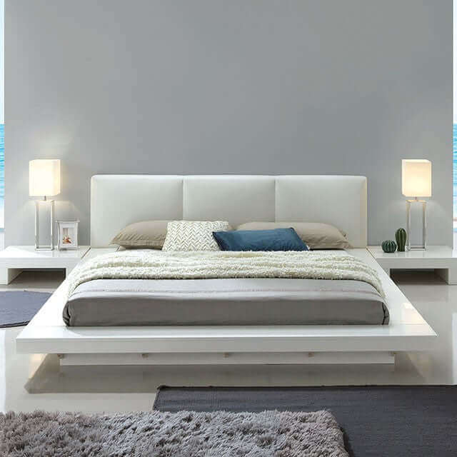 Christie White modern platform bed featuring sleek minimalist design, low-profile headboard, and flush night stands in a stylish bedroom setting.