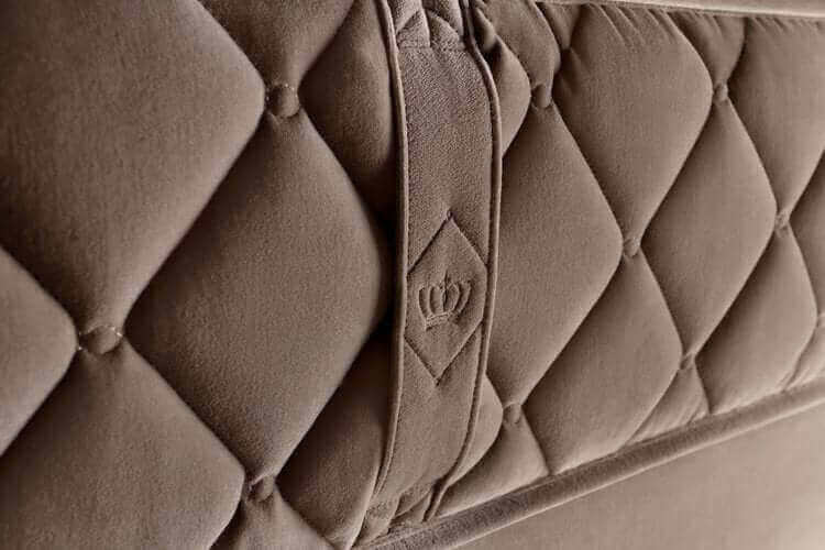 Close-up of the plush, tufted fabric on a Chattam & Wells mattress showcasing luxurious design and craftsmanship.