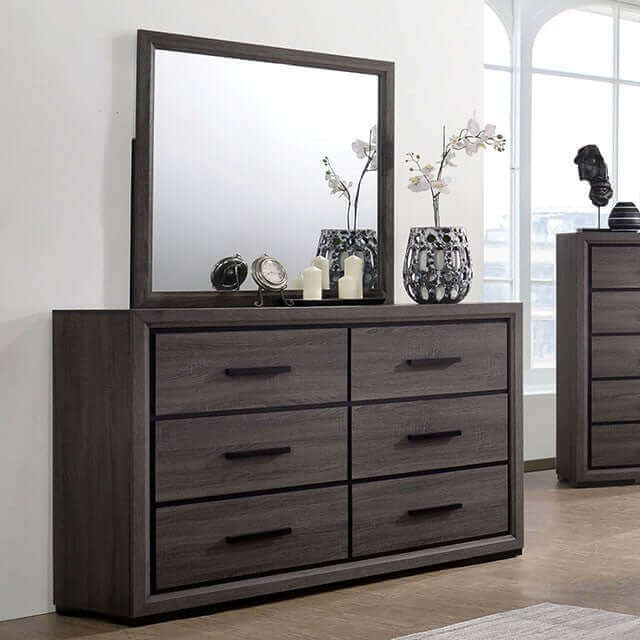 Modern dark gray dresser with six drawers and matching mirror, perfect for versatile bedroom decor.