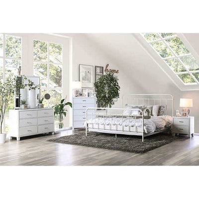 Iria White Metal Bed in modern bedroom with stylish decor and natural light from large windows.
