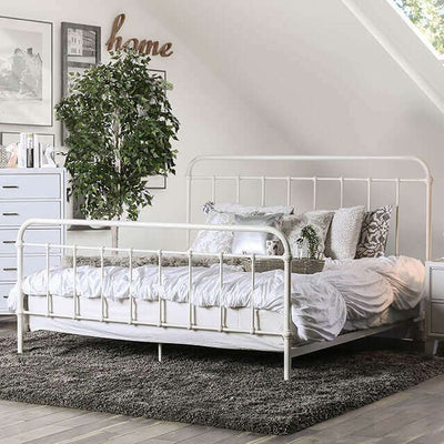 Iria White Metal Bed with spindles, elegantly modern design, full metal construction, and cozy bedding in stylish bedroom setting.