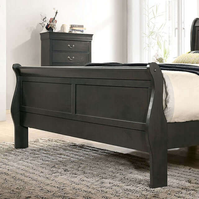Louis Philippe gray slate sleigh bed design with matching nightstand in a stylish bedroom setting.