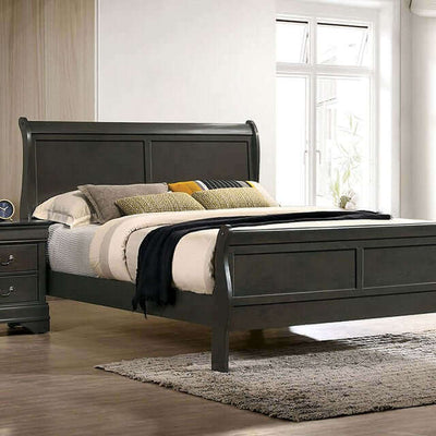 Louis Philippe gray slate sleigh bed with matching nightstand in a stylish master bedroom setting.