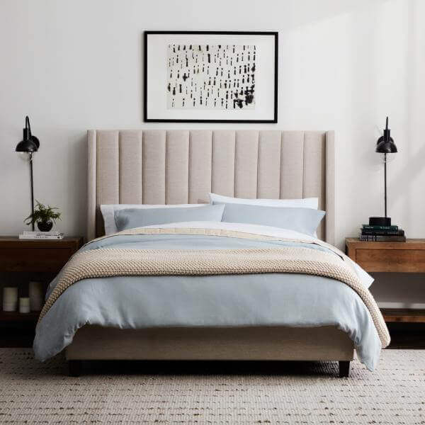 Malouf Blackwell Oat Beige Headboard with elegant vertical channels in a stylish bedroom setting.