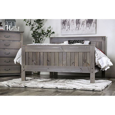 Rockwall brushed gray panel bed featuring plank style construction and weathered finish in a cozy bedroom setting.