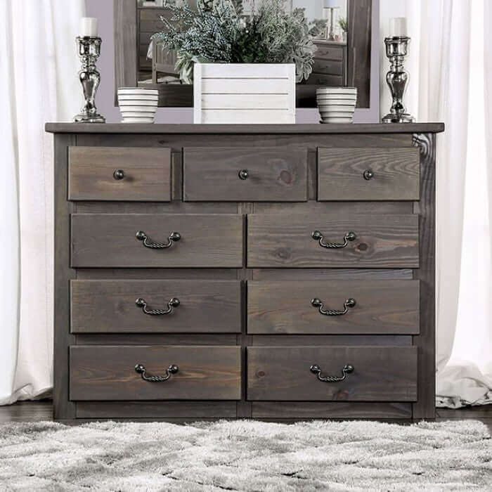 Rustic Rockwall Gray Dresser in American pine wood, featuring 10 drawers and a weathered finish, styled in a cozy interior setting.