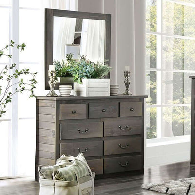 Rockwall Gray Dresser featuring rustic weathered gray pine wood with ample storage, styled with a mirror and decorative plants.