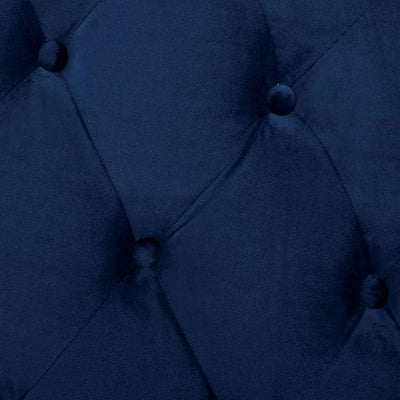 Close-up of Ryleigh Navy Blue Bed's plush flannelette fabric and tufted design, showcasing elegance and comfort.