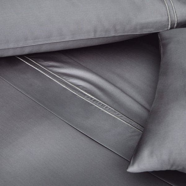 Malouf Premium Charcoal Supima® Cotton Sheet Set showcasing soft, luxurious sateen weave and extra-deep fit.