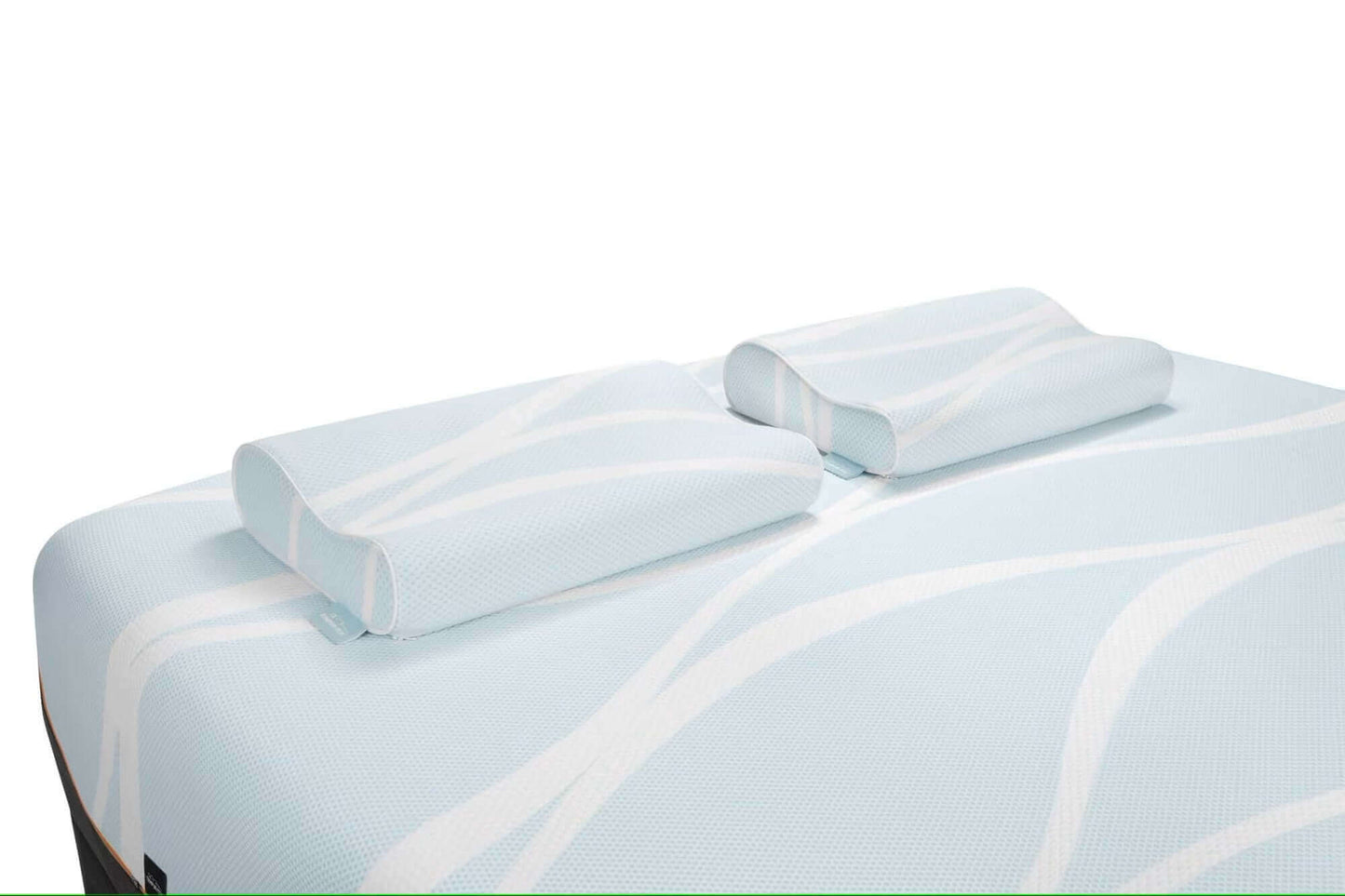 TEMPUR-Breeze° Neck + Advanced Cooling Pillows on a light blue surface, showcasing their ergonomic design and cool-touch fabric.