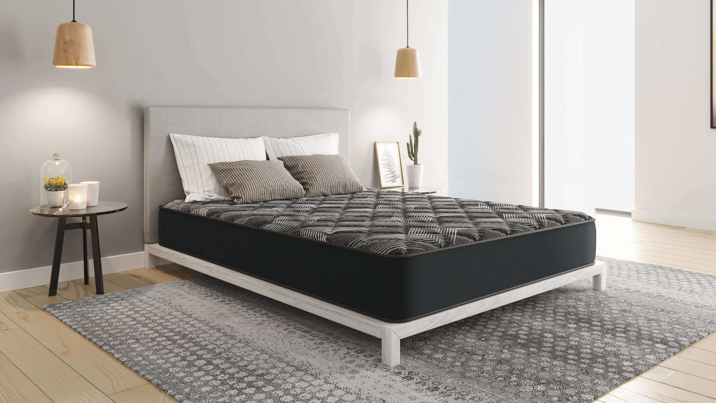 Diamond Rock Extra Firm 12" Mattress displayed on a modern bed frame in a stylish bedroom setting.