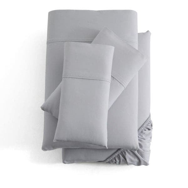 Malouf Ash Soft Knit Microfiber Sheet Set in light gray, featuring extra deep fit and soft brushed texture for cozy comfort.