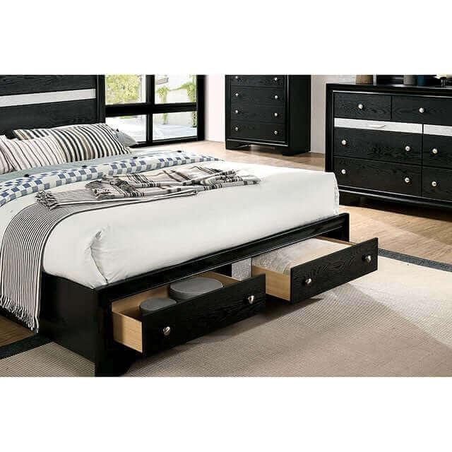 Chrissy Black Storage Bed with sleek design and pull-out drawers, showcasing a modern bedroom aesthetic.