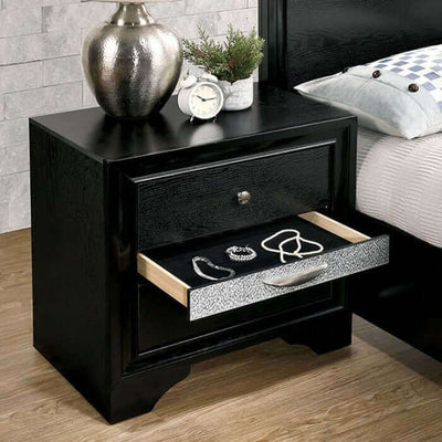 Chrissy Black Nightstand with silver drawer pull showcasing jewelry, stylish décor for a contemporary bedroom.