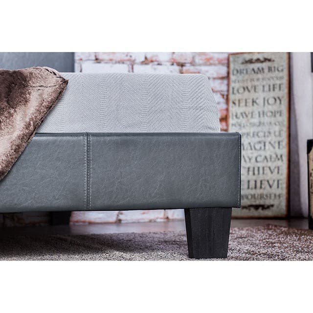 Contemporary gray leatherette platform bed with sleek design and wooden legs, perfect for modern bedrooms.