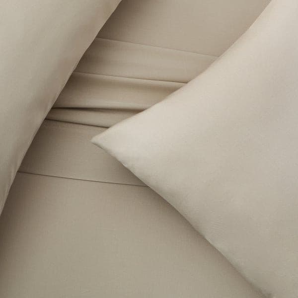 Malouf Smooth Driftwood Bamboo Rayon Pillowcase Set in soft beige, showcasing silky, breathable texture and temperature regulation.