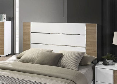 Modern Erlangen white bed with two-tone design and sleek chrome handles in an elegant bedroom setting.