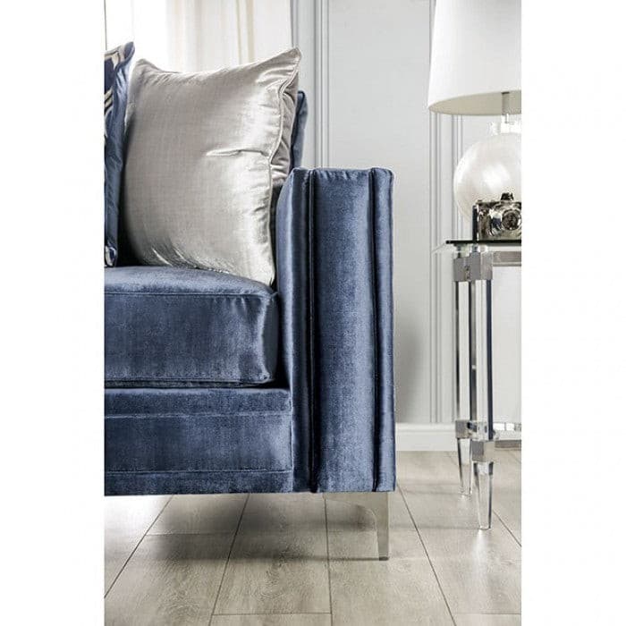 Jodie Satin Blue Contemporary Sofa side view with silver pillows and acrylic side table, showcasing elegant design details.