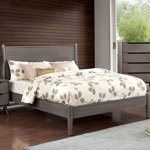 Modern Lennart Gray Platform Bed featuring tapered legs and a stylish floral bedding set in a bright bedroom setting.