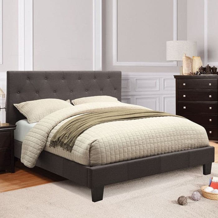 Leeroy Gray Platform Bed with button-tufted headboard and cozy bedding, perfect for a refined bedroom ambiance.