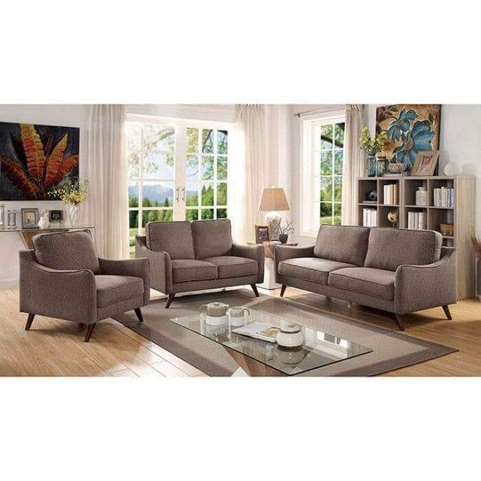 Mid-century modern light brown loveseat and chairs in a stylish living room with natural light and elegant decor.