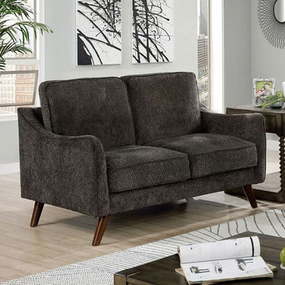 Mid-century modern dark gray loveseat with tapered legs and plush cushions in a stylish living room setting.