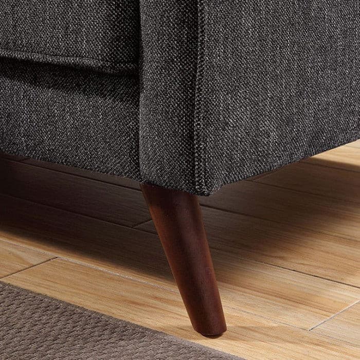 Close-up of Maxime Gray Mid Century Loveseat leg, showcasing tapered wooden design and durable gray upholstery.