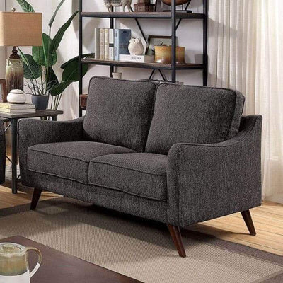 Mid-century modern gray loveseat with tapered legs and box cushions in a stylish living room setting.