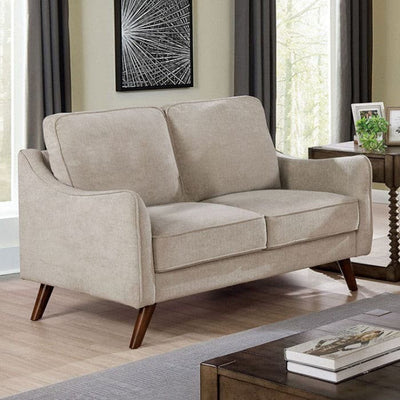 Light gray mid-century modern loveseat with curved arms and tapered legs in a bright living room setting.