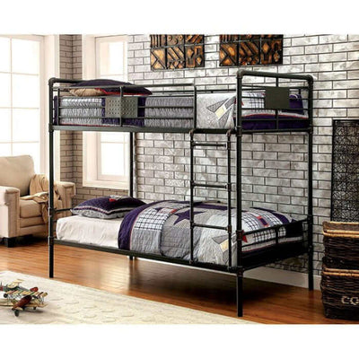 Antique black metal bunk bed with industrial design, featuring built-in slats and patterned bedding in a cozy room setting.