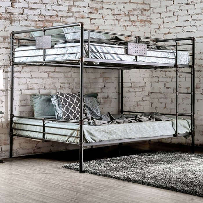 Antique black metal bunk bed with industrial pipe framework and stylish bedding, perfect for modern bedroom decor.