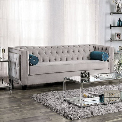 Silvan Gray Velvet Transitional Sofa with button tufting and round lumbar pillows, set in a stylish living room setting.