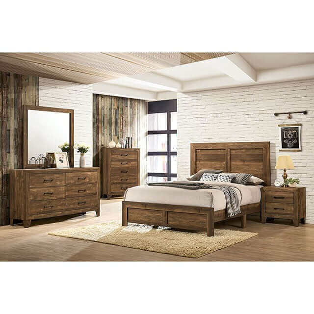 Wentworth rustic bed set featuring antique wood grain and classic design, including dresser and nightstand in a cozy room setting.