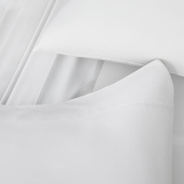 Malouf Smooth White Bamboo Rayon Pillowcase Set showcasing silky soft, breathable pillowcases designed for comfort and temperature regulation.