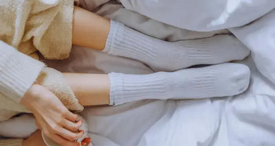 Pros & Cons: Should You Be Wearing Socks to Bed?