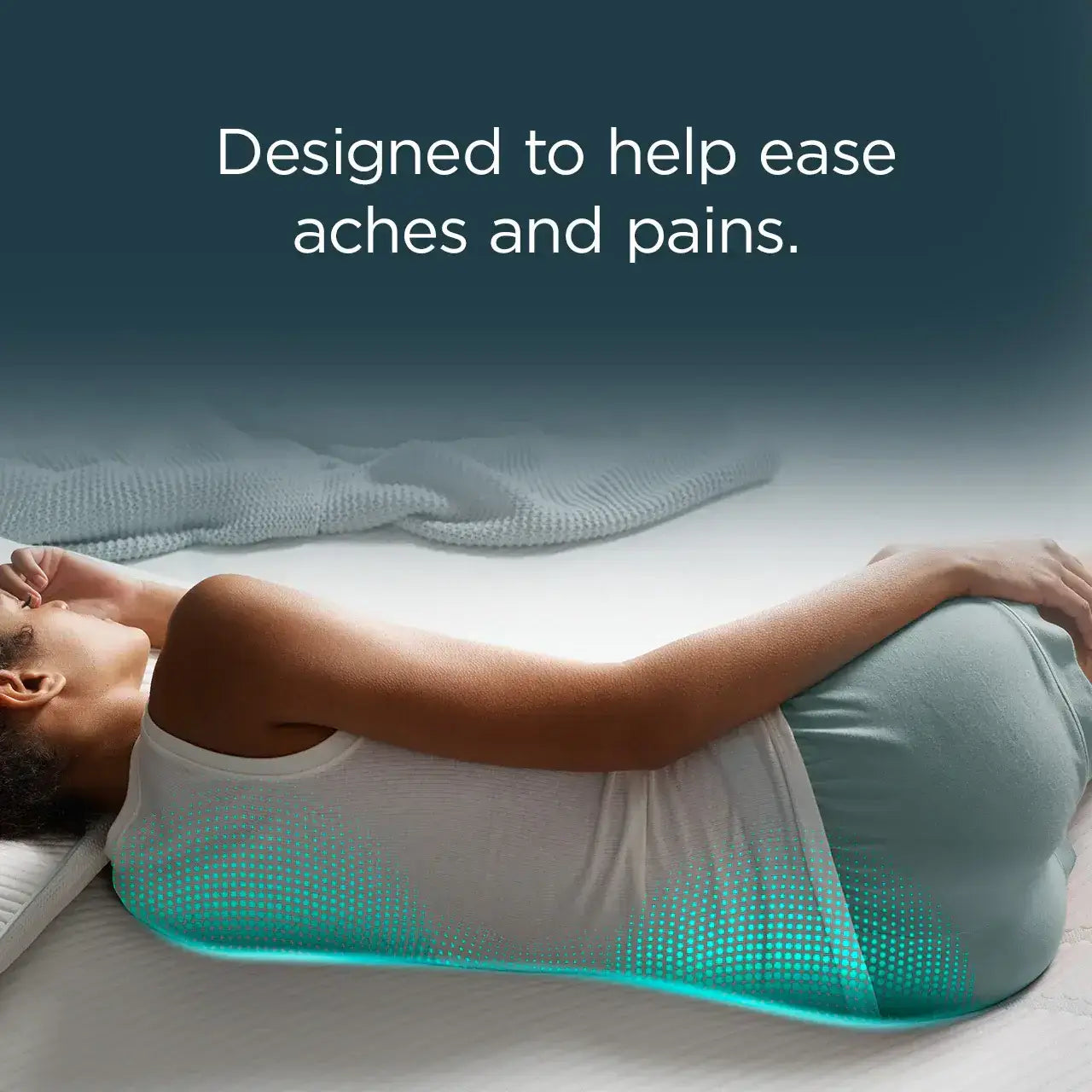 Woman sleeping on a mattress designed to ease aches and pains for better comfort.