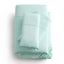 Mint green Malouf Opal Botanical Tencel™ Lyocell sheet set featuring a fitted sheet, flat sheet, and pillowcases.
