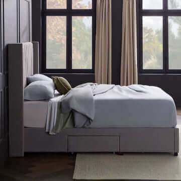 Malouf Watson Charcoal Platform Bed Frame with storage drawers, contemporary design, and soft neutral bedding in stylish bedroom setting.