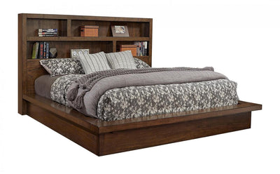 Modern Loft Brownstone Platform Bed with storage, featuring a stylish headboard and cozy bedding in a contemporary design.