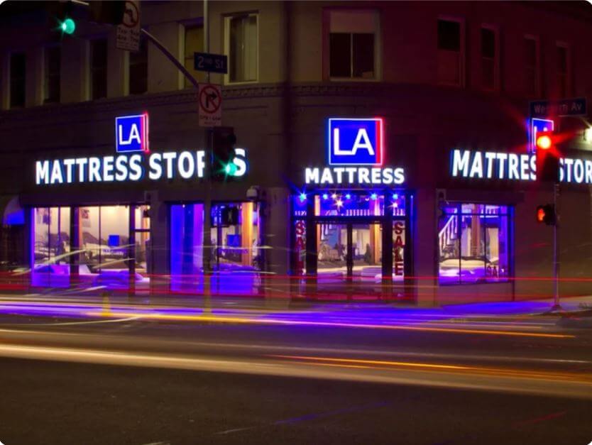 Koreatown Mattress Store with vibrant neon signs in Los Angeles