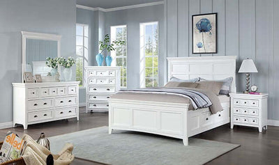 Castile White Storage Bed set in a serene bedroom with soft decor, showcasing crown molding and ample storage drawers.