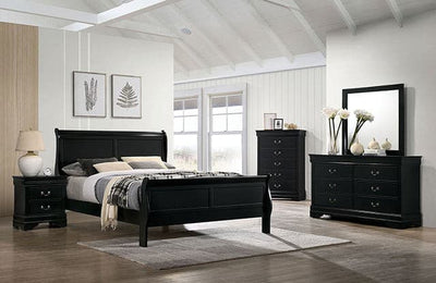 Black transitional nightstand beside a sleigh bed in a stylish master bedroom with matching furniture pieces.