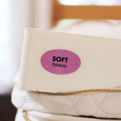 Soft Talalay label on organic mattress showcasing premium comfort and quality.