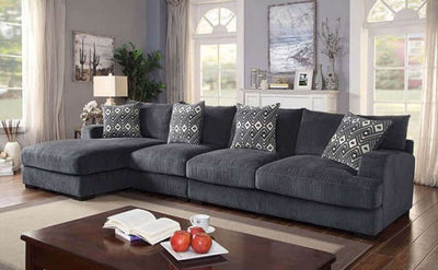 Kaylee Gray Sectional Sofa with plush cushions and accent pillows in a stylish living room setting.