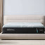 Tempur-Pedic TEMPUR-LuxeAdapt® 13" Medium Hybrid Mattress on a stylish bed frame in a cozy bedroom setting.