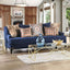 Sisseton Blue Transitional Sofa with decorative pillows in a modern living room setting, featuring elegant nailhead accents.