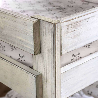Close-up of rustic pine wood corner joinery on Arlette Brushed White Bunk Bed, showcasing its natural grain and craftsmanship.